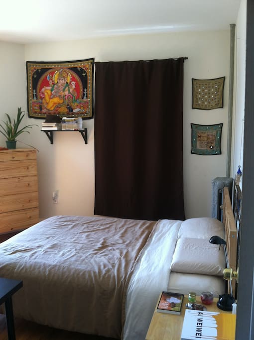 The bedroom includes a queen-sized bed, a nice closet, a work desk, and a five-drawers chest.