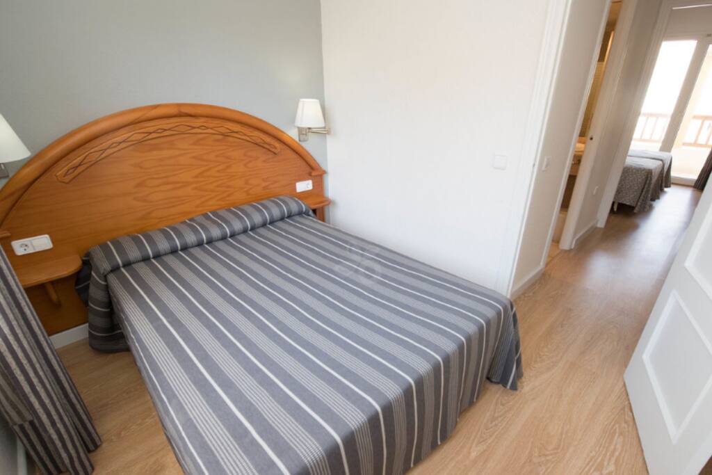 Dormitorio cama matrimonio