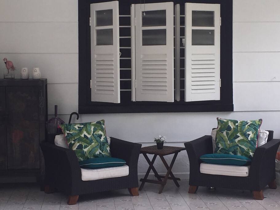 Lovely covered porch overlooking the garden