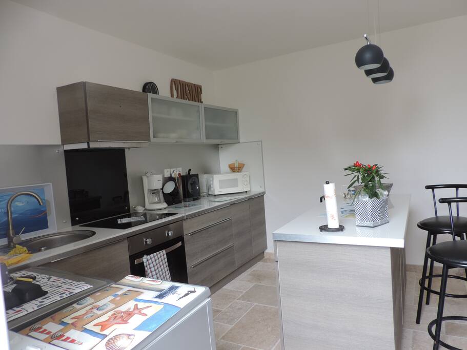Cuisine moderne, fonctionnelle et équipée.