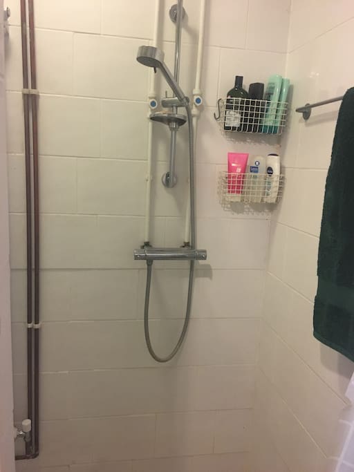 Simple wet room without power shower - it is a wet room which means the whole room gets wet