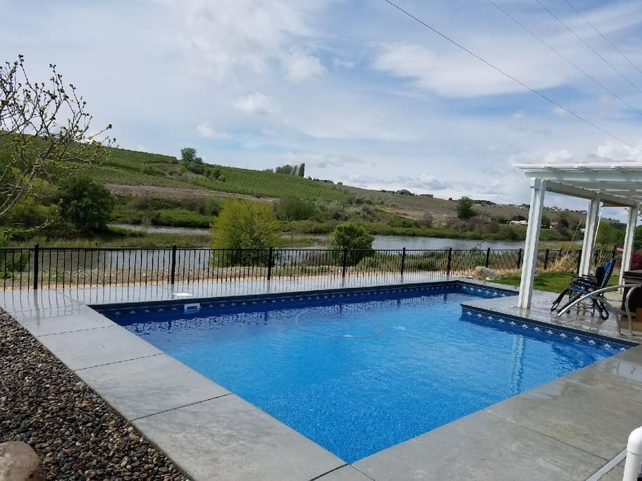 Swimming pool is brand new, hot tub is under the patio to right of photo
