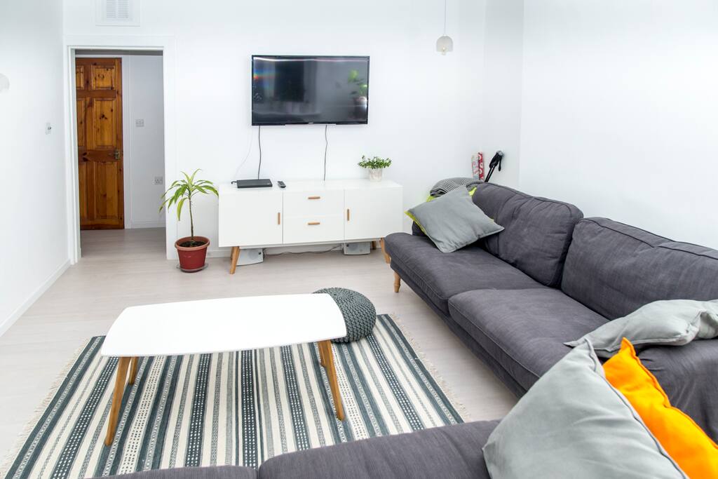 Specious living room with two big comfy sofas.