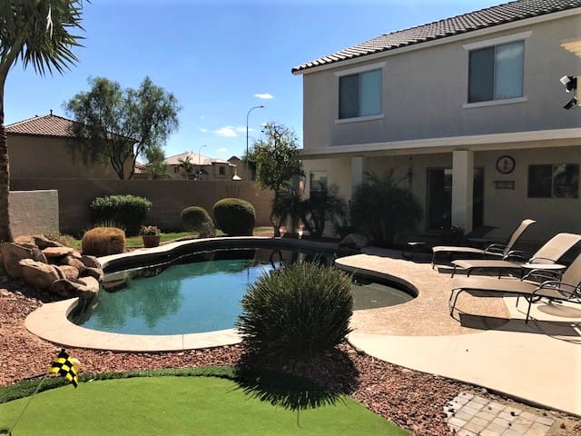Heated pool, Outdoor fireplace and Putting green!