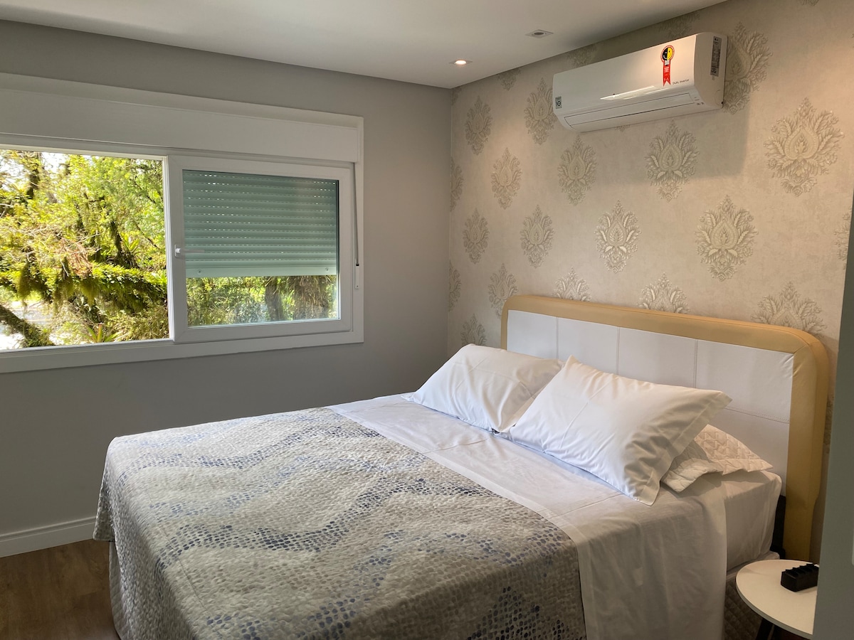 ห้องพักพร้อมเตียงคู่ควม/เครื่องปรับอากาศร้อน/เย็นพร้อมวิวสวนสวยๆ 