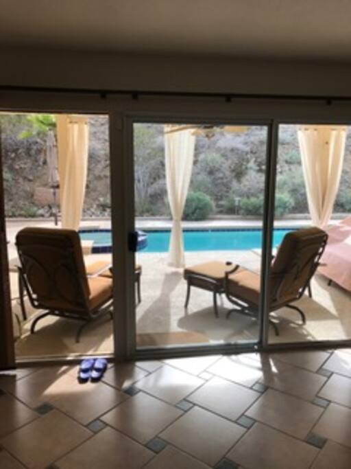 Master Suite Floor to ceiling doors open to private pool