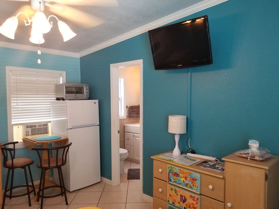 Another view of studio, bathroom entrance...