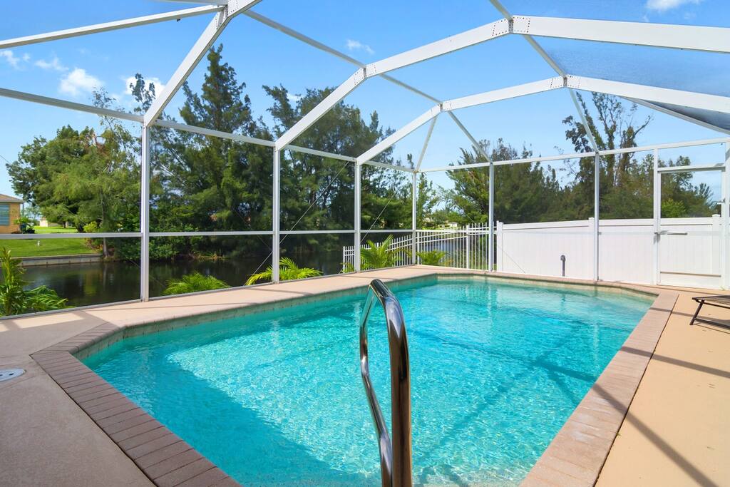 Private heated swimming pool fenced in