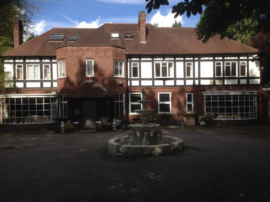 Front of the house and parking space