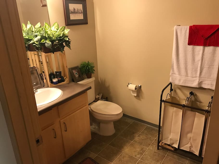 Fully stocked bathroom.