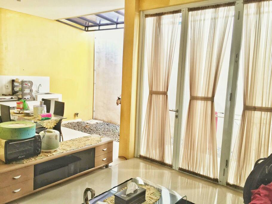 View from sofa : Dining room, kitchen and small garden #openspace #good air circulation