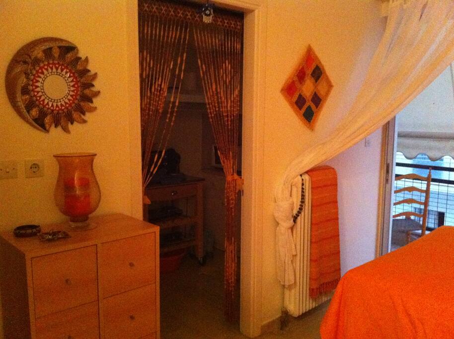 Kitchen entrance, dresser and drawers, closet not seen