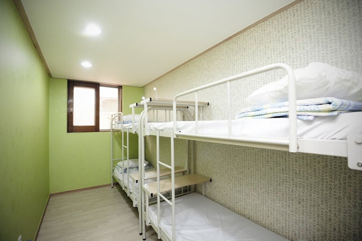 4 bedrooms wth 4 beds each (air conditioner system and fans). Rooms separate for Men and Women (no mixed rooms).