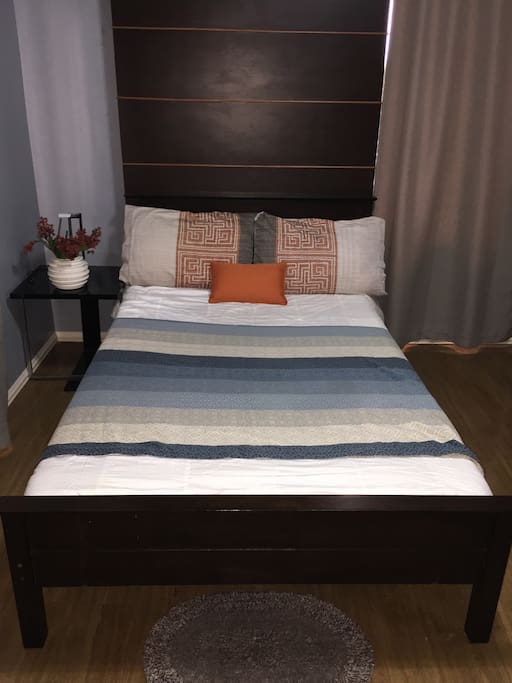 Couple bedroom with TV sets