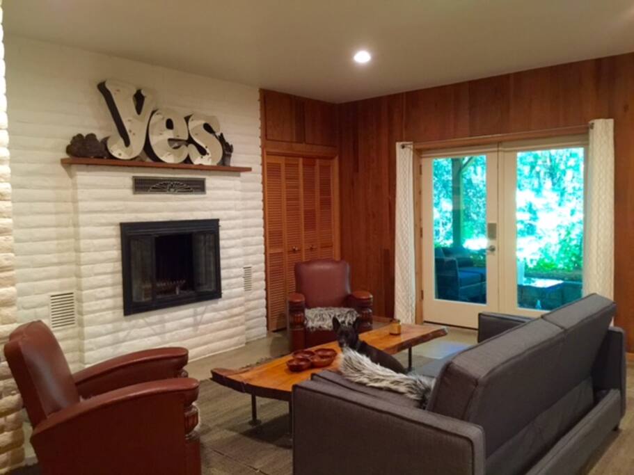 The french doors which open to the your own private sunken patio, and the forest beyond.