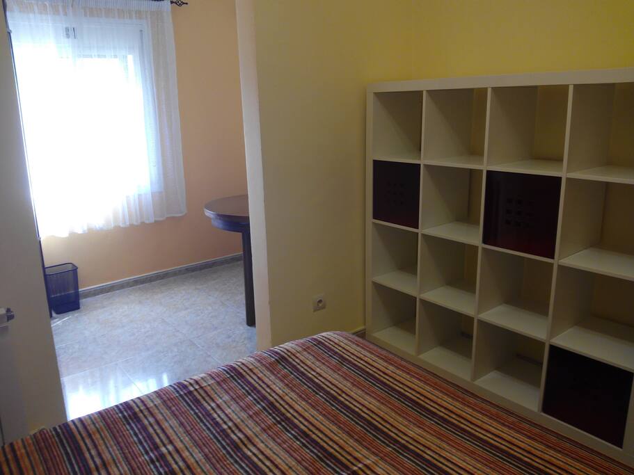 Dormitorio y sala privada