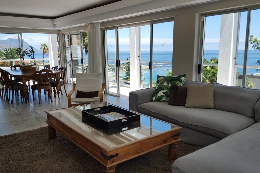Airy Lounge/Dining room area with Clifton First Beach below!