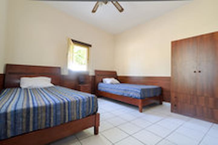 Room with two big comfortable single beds