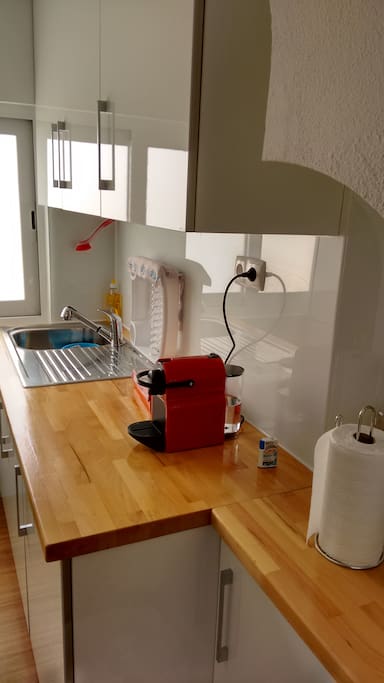 Charming build-in kitchen has all you need to prepare your meals and a nice coffee machine