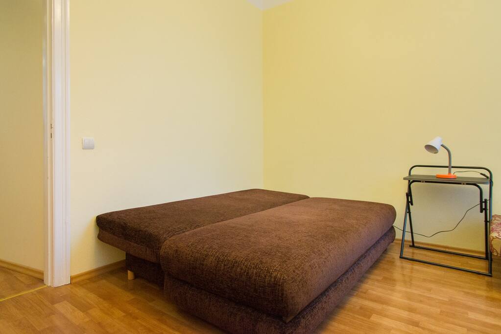 Double sofa in large room