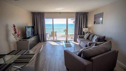 Sunset and beach view from your balcony Unit 403