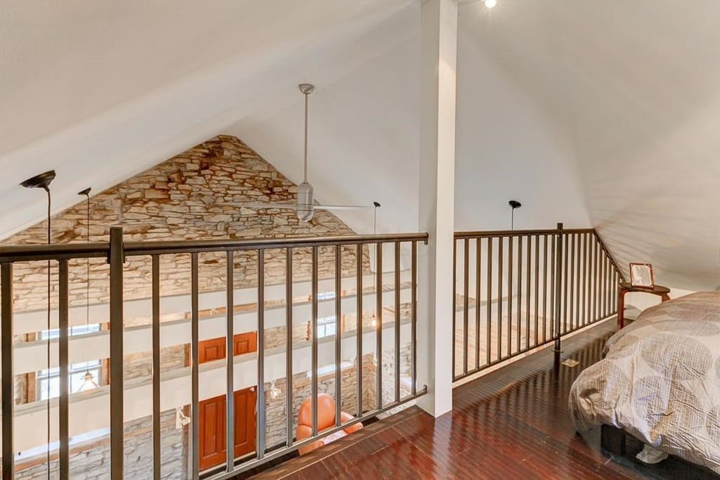 Loft bedroom with a queen size memory foam mattress