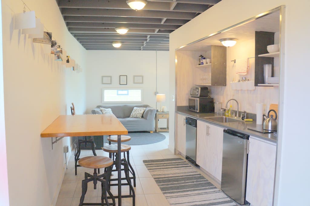 The galley kitchen was custom built by the local design firm TAKD, and has everything for a short term stay.