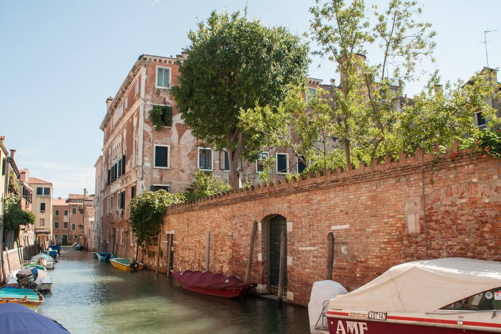 At the first floor of this building, the picture shows the garden side and the canal side of the Apartment