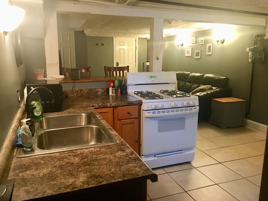 Full kitchen with stove, fridge, microwave, and whatever you need to prepare a meal