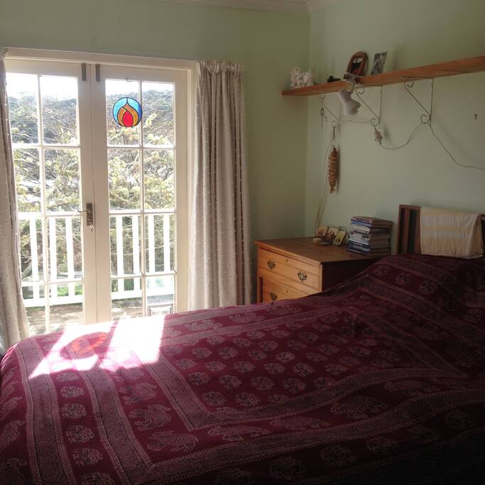 Lovely sunny room with French doors to verandah