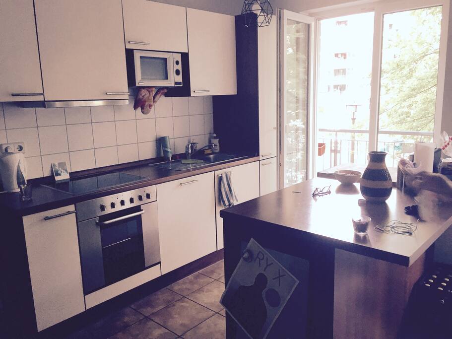 This is the kitchen, where you can cook or go to the balcony to smoke.