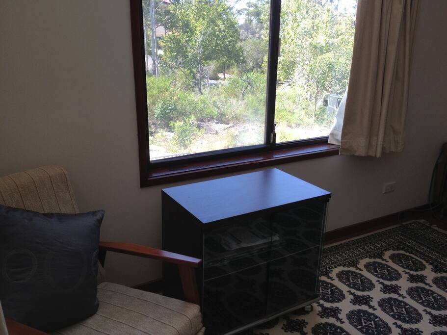 Room looks out onto bush