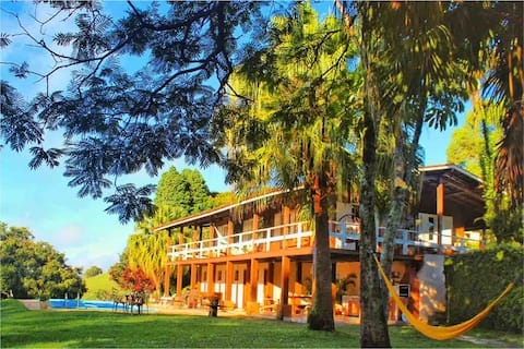 Heated pool, wood-burning fireplace, lake.