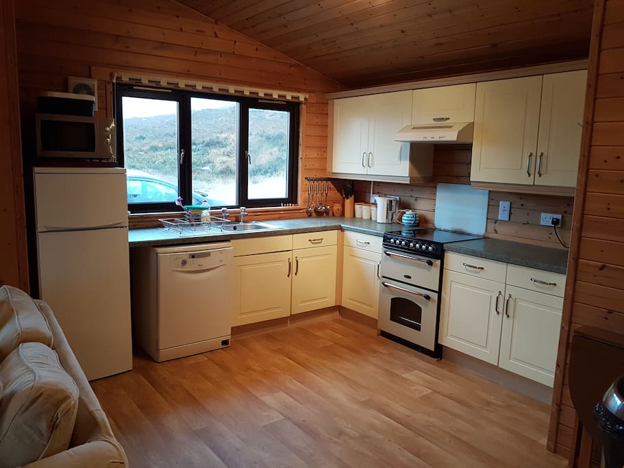 Well equipped kitchen with fridge/freezer and new cooker
