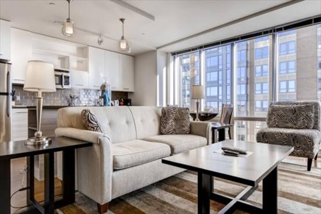 Spacious living room with open kitchen
