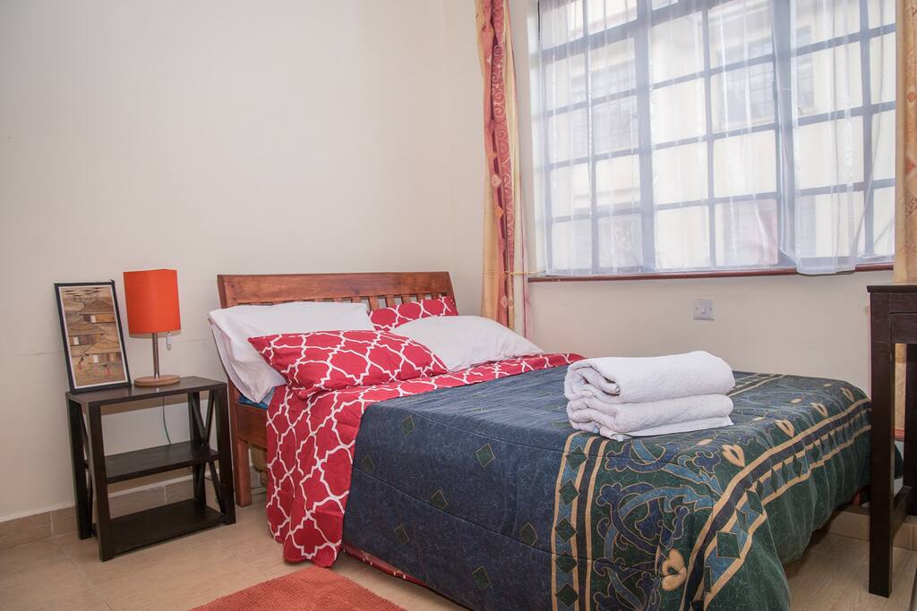 Spacious private room with a Queen size bed,spacious wardrobes and high density mattress