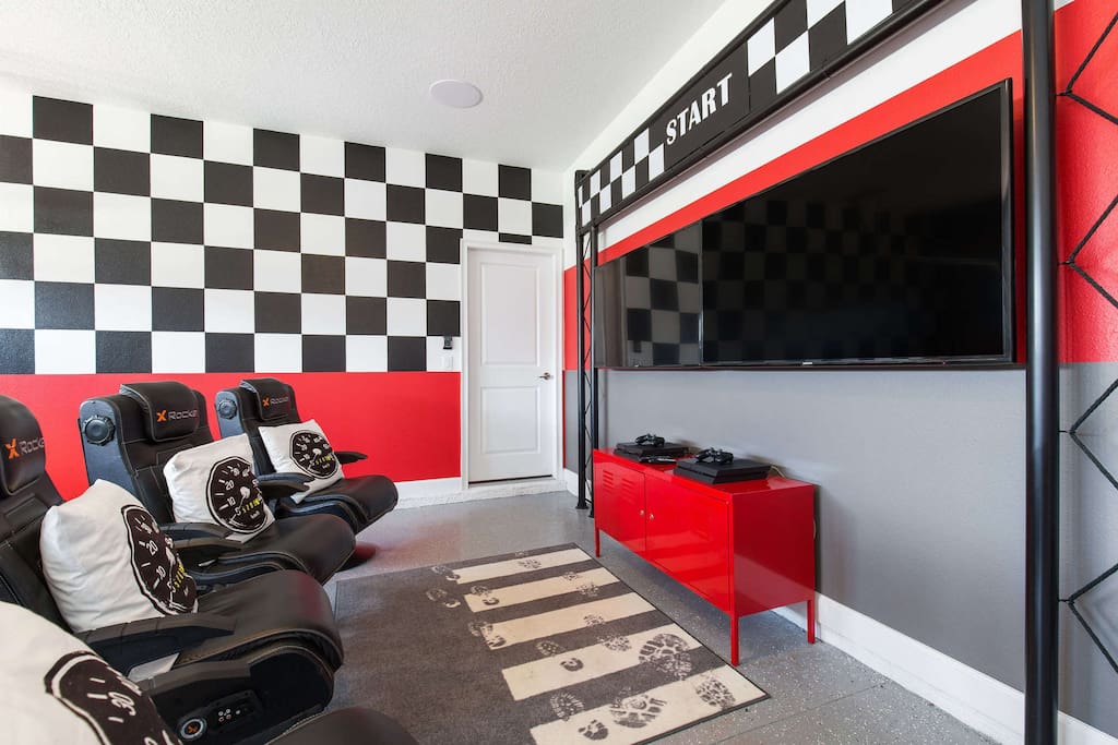 The gaming station features two mounted LCD HDTV's, 4 X Rocker Pro chairs, and 2 PlayStation 4's.