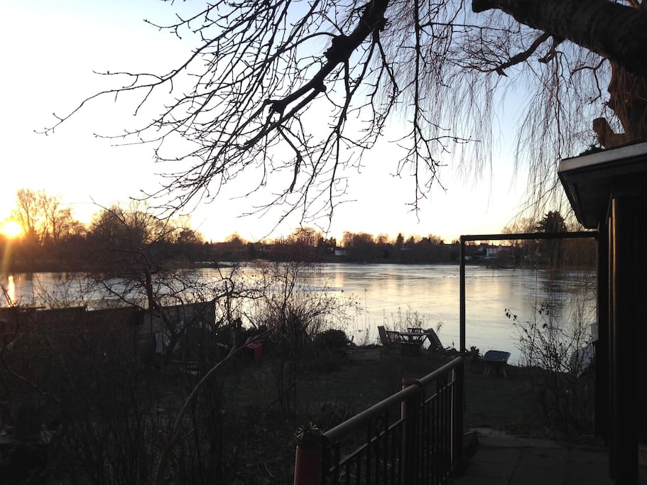 Sunset over lake from garden