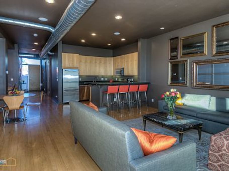 Wood floors throughout, with contemporary furnishings.