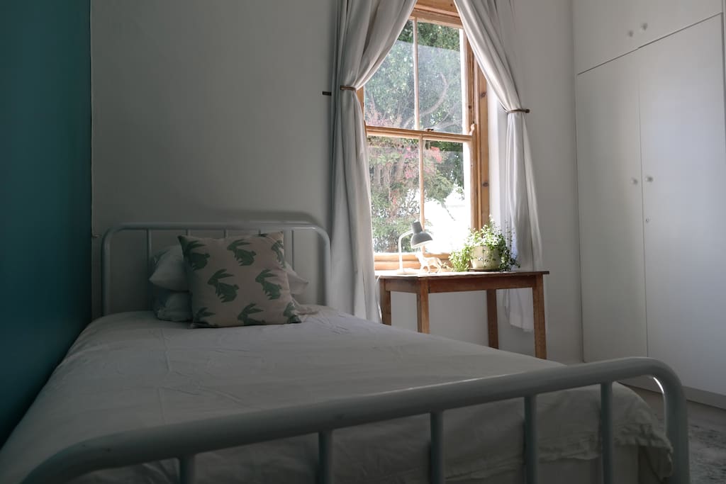 Second bedroom with beautiful light and cupboard space