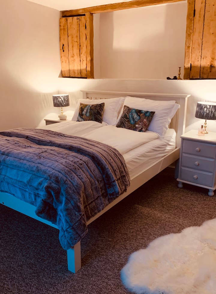 Spacious double bedroom with king size bed