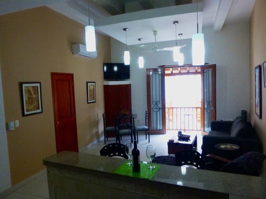 Looking from your kitchen across the common room out towards the balcony