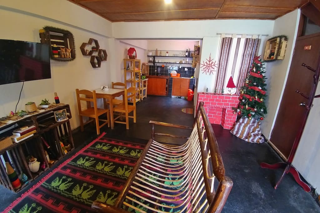 Common area with fully equipped kitchen and living area