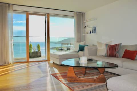 Top Airbnb: Falmouth's beachfront gem with panoramic views. in Falmouth
