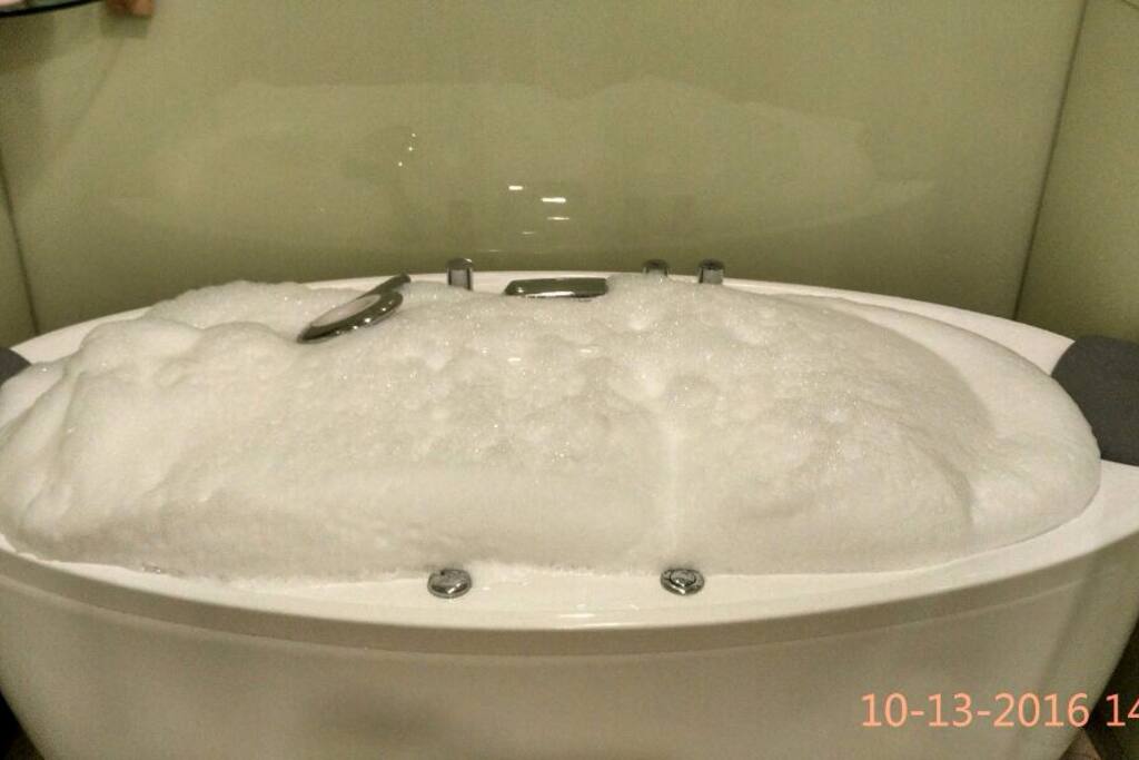 Jacuzzi bath tub. Bubble bath not provided.