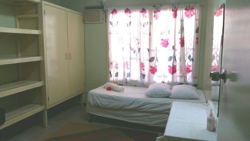 Private bedroom in spacious oceanview home