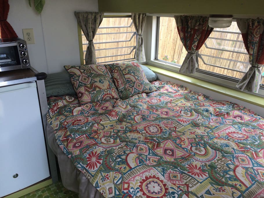 Plush double bed with canyon breezes and sunshine streaming in