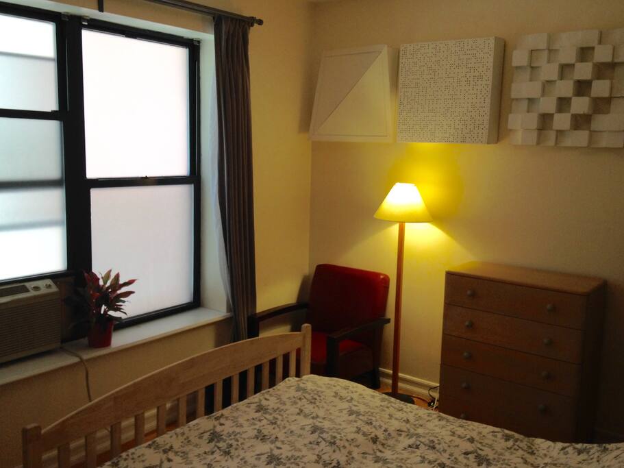 Privacy film on windows to let light in, and dark curtains for night.
