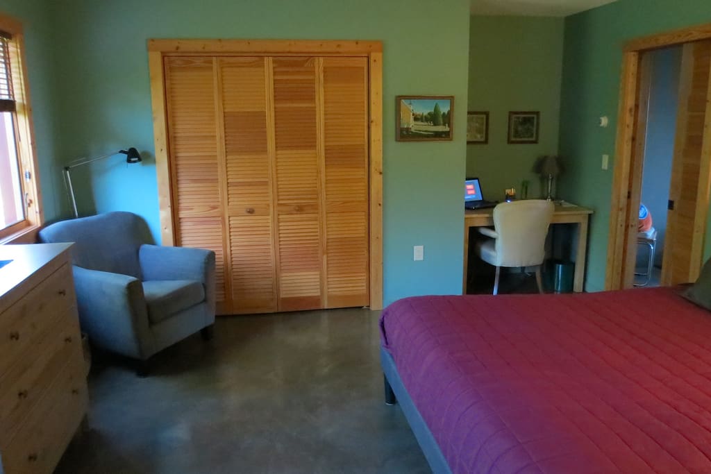 The spacious guestroom with king bed