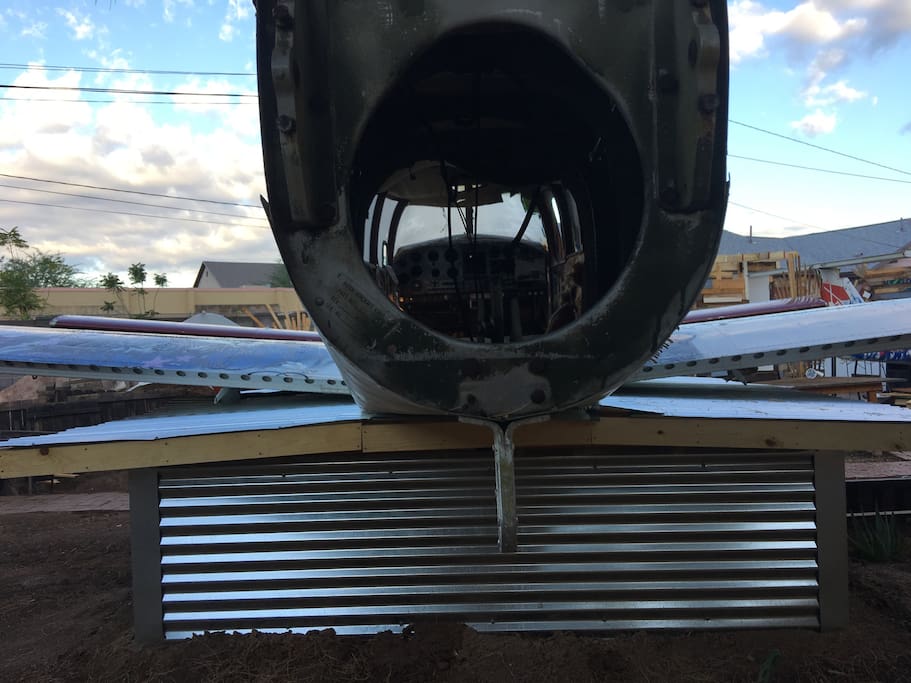 Yes, that really is a plane sitting on top of this unique unit!